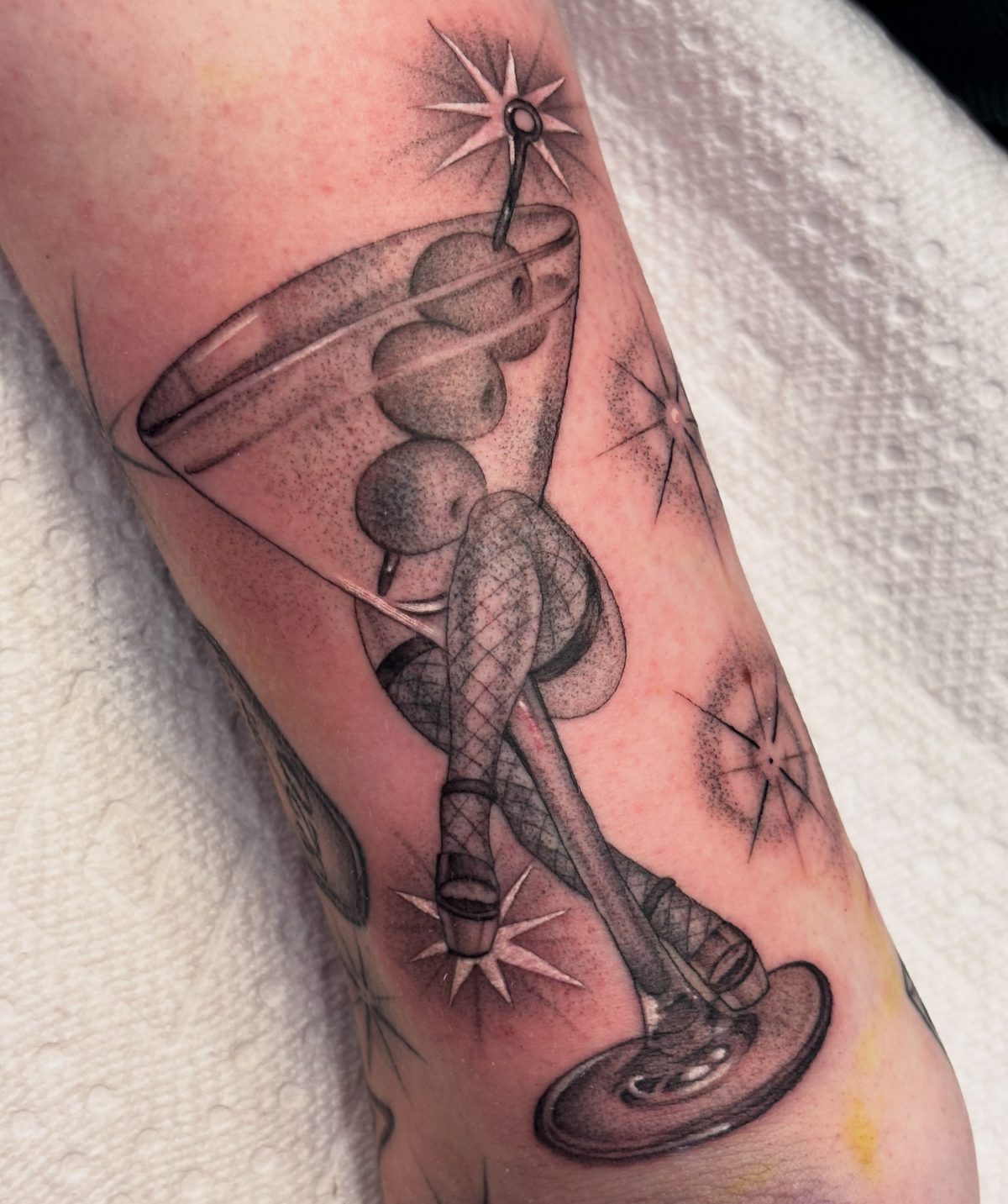 Fine line illustrative lamp tattoo completed in Las Vegas