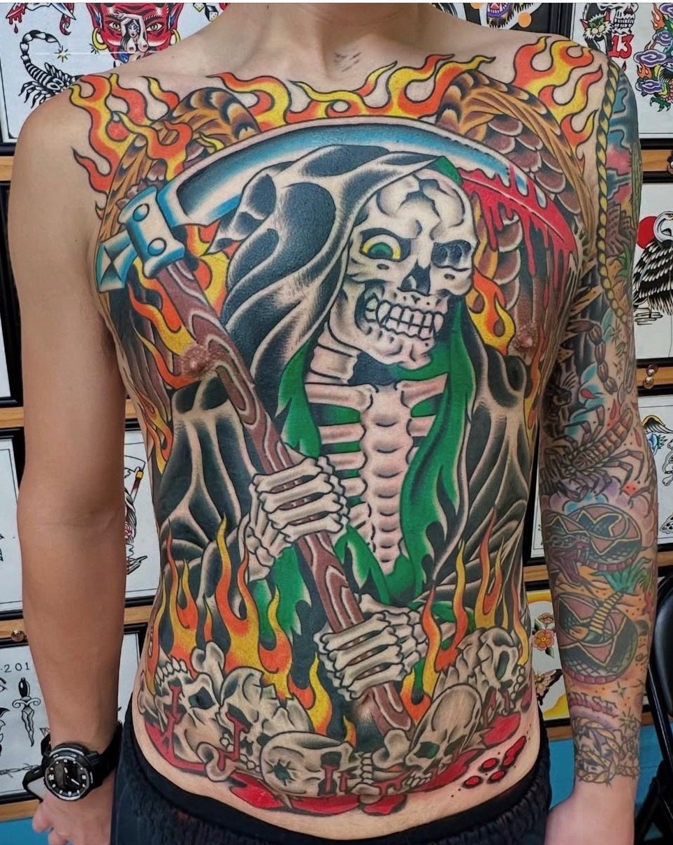 Large custom grim reaper torso tattoo with flames completed at Last Chance Tattoo in Las Vegas